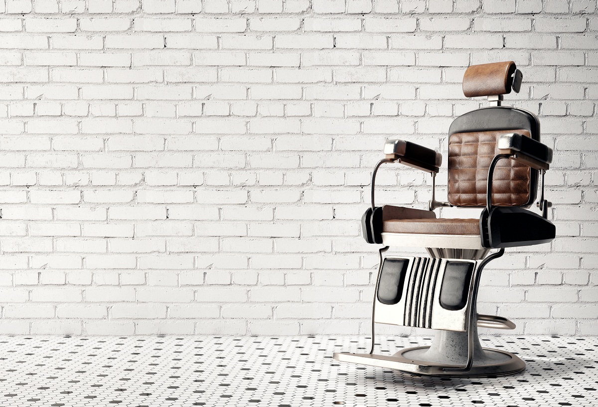 Hydraulic reclining barber chair
